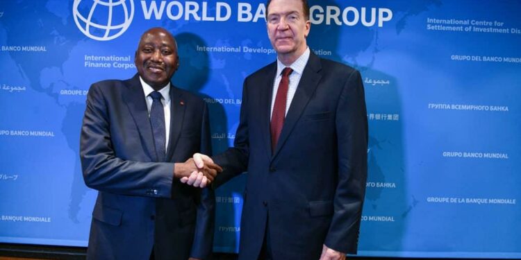 Assemblées Annuelles Banque mondiale-FMI : Amadou Gon Coulibaly, plaide pour un « revenu décent » pour les producteurs de cacao de la Côte d’Ivoire et du Ghana