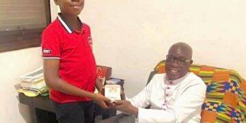 Le champion du monde de dictée félicité par le cardinal Kutwa 